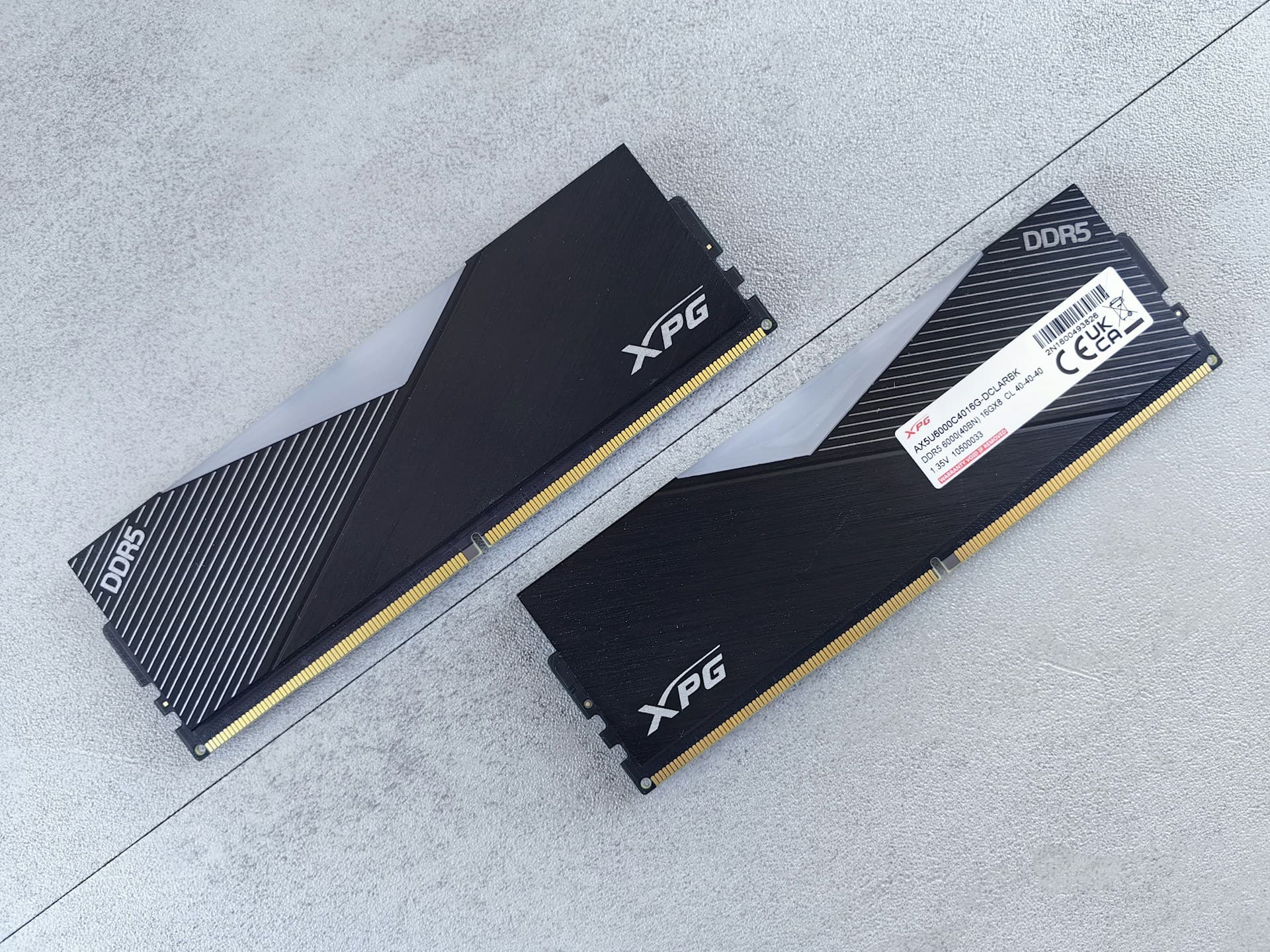 Two ADATA XPG DDR5 RAM sticks laid out showing DDR5 6000MHz 16GB memory kit